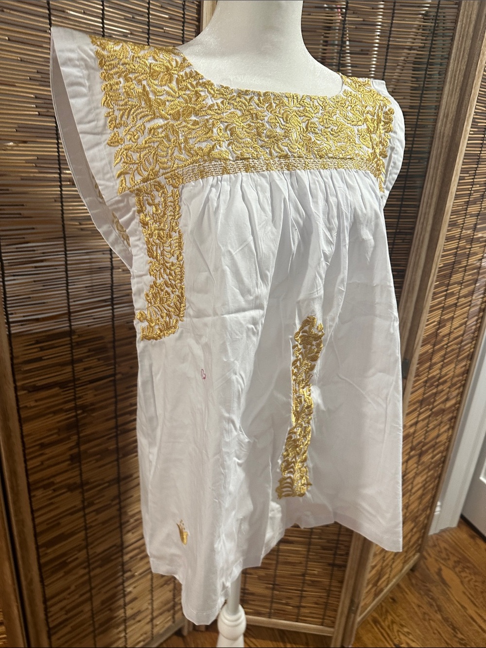 White Embroidered Sleeveless Women’s Top with Gold Accents